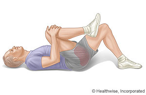 Picture of how to do the knee-to-chest exercise