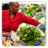 Photo of a woman shopping for fresh vegetables