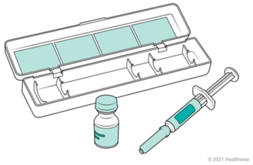 Glucagon emergency kit with syringe, medicine, and plastic case.