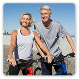 Photo of man and woman riding bikes