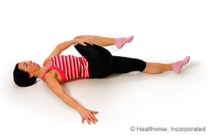 Photo of piriformis stretch while lying down