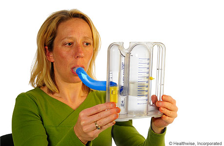 Person taking a slow, deep breath Person taking a slow, deep breath