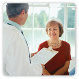 Photo of woman meeting with doctor